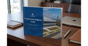 Anchor1031 Property Due Diligence Guide booklet displayed on a wooden desk