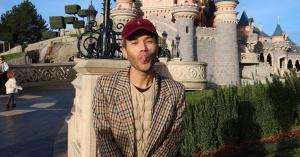 Mike standing in front of Sleeping Beauty Castle at Disneyland Paris during his festive season press trip.