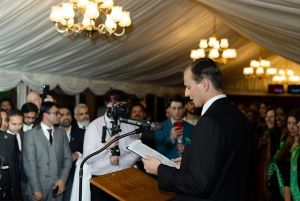 Elvijs Plugis giving a speech at the UK Parliament about investment strategy and venture capital trends.
