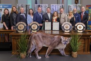 Representative Allison Tant and Senator Jason Brodeur join the Florida State Parks Foundation and Florida State Parks Director Chuck Hatcher to present matching resolutions declaring February 4, 2026, as Florida State Parks Day. Photo by Colin Hackley.