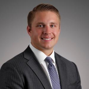 man smiling in a business suit