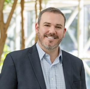 Image of William Shida, President and COO of Extu