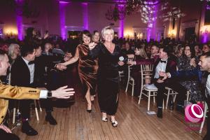 TDR Bridal team heading to the stage to accept their award