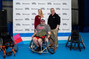 Three people posing for photo