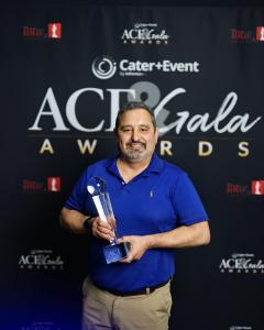 Chef Serge Krikorian of Vibrant Occasions Catering holds the 2026 ACE Award for Catered Micro Event of the Year at the Catersource + The Special Event ACE Gala in Los Angeles on March 3, 2026. Photo credit: Catersource + The Special Event / ACE Gala.