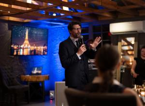 François Guilloux of VINO Distribution speaks about the evening’s wine pairings during the FUSION360° culinary experience at Rusty Tractor Vineyards in Little Rock on August 28, 2025. Photo credit: Lori Sparkman Photography.