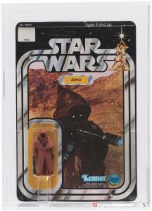 Blister card containing a 2¼-inch-tall Star Wars Jawa action figure of the initial “Vinyl Cape” variety, made by Kenner in 1978, graded AFA 95 Mint, the highest grade Hake’s has ever offered for the toy. Estimate: $40,000-$60,000