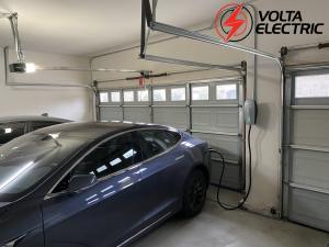 A car being charged from an EV charger in Santa Monica installed by Volta Electric