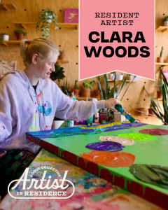 Clara Woods painting a colorful abstract canvas in her studio as Rogue Collective’s first artist in residence in Newport Beach, Calif..