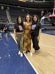 Farrah Mechael and Tamara Mechael standing on the basketball court at Intuit Dome during the Ballin’ 4 Peace International Women’s Day event.