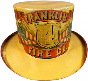 Circa 1880-1915 Franklin Fire Co. papier-mache ceremonial parade hat. Commemorates 1802 founding of the Benjamin Franklin Fire Company No. 4. Provenance: David Bausch collection. Sold for $16,800