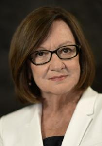 Headshot photo of Denise Ovalle, NAEBA Member and Broker of Buyer One