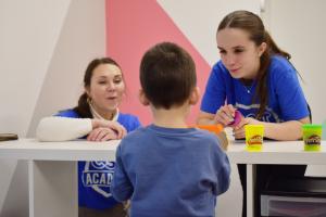 Young child participating in therapy with a clinician at CST Academy’s Park Ridge clinic.