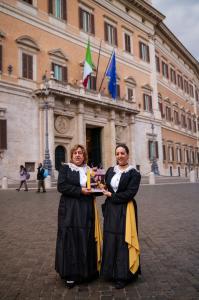 Franca Grispino and daughter, Maria Teresa Nappi outside of Italian Parliament where they were recently asked to present their new cookbook, The Butcher's Daughter- Stories and Over 100 Recipes from Altomonte's Italian Market, cobblestone street of Rome, 
