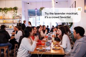 Photorealistic scene of a diverse group of Gen Z and Millennial friends (including Asian, Black, and Hispanic individuals) laughing and chatting over colorful non-alcoholic mocktails at a communal table in a modern, well-lit Chicago neighborhood café turn