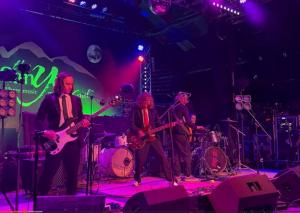 Foursome of indie punk band on stage