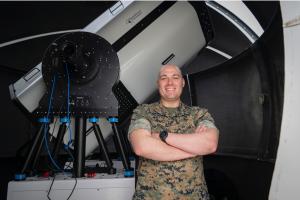 Naval Postgraduate School (NPS) graduate student U.S. Marine Corps Capt. Chris Henderson is using the NPS Mobile CubeSat Command and Control network and telescope to conduct cutting-edge, satellite optical communications research.