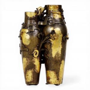 Imperial Chinese gilt splashed patinated bronze double vase, Qianlong (1736-1795). Estimate: $15,000-$25,000
