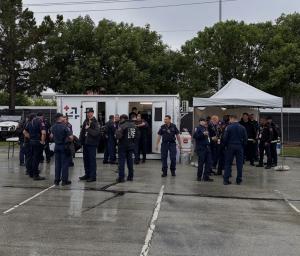 Arlington Fire Department personnel outside a MobileOp4 mobile medical unit during the 2026 World Cup