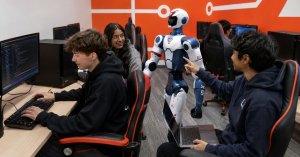 iCode Youth Innovation Program Students work with a Unitree Humanoid Robot