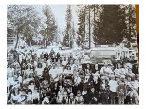 Families enjoying the historic Olympic-size swimming pool at Loch Lomond Resort in Lake County, California.