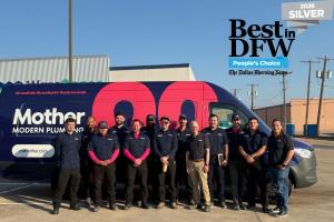 The staff of Mother Modern Plumbing's Dallas TX office poses after winning a 2026 Best in DFW Award.