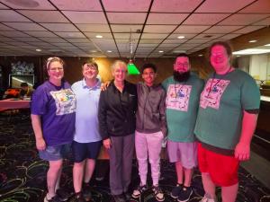 Equature employees and Motown Invitational Classic committee members at the 2026 tournament.