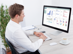 Picture of a guy using PROCAS software.