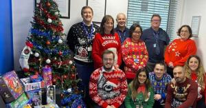 B&H Worldwide staff with gifts for The Giving Tree