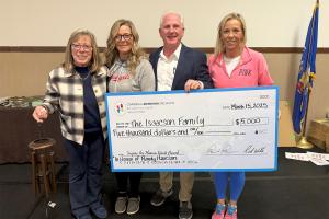 The Randy Isaacson Family Accepts the Inspire the Human Spirit Award