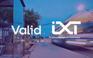 Valid and IXT partner to deliver seamless IoT Connectivity. Image background is moving bus with blurred light, overlayed with both logos in white.