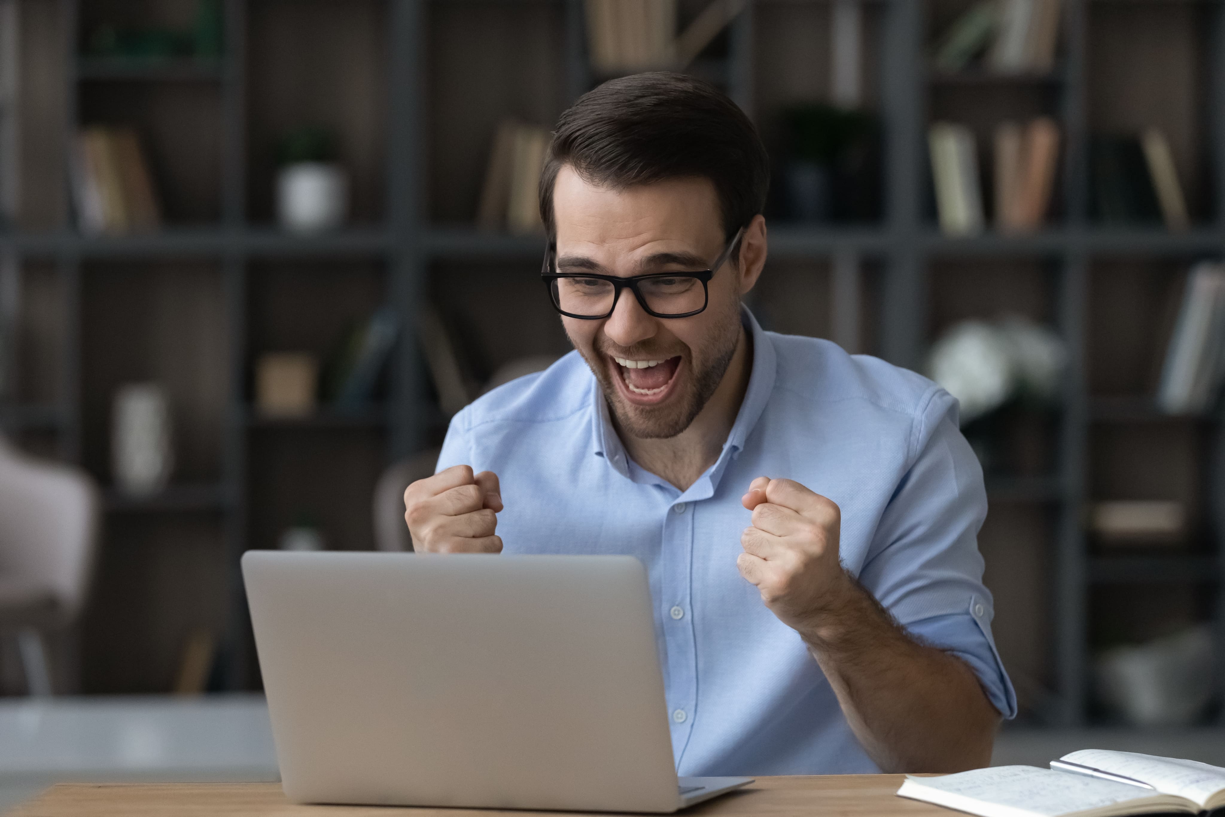 overjoyed young businessman man