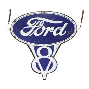 Two Canadian 1930s single-sided porcelain Ford V8 Dealer signs mounted back-to-back, 79 inches by 76 inches, in the original frame, including brackets. Estimate: CA$20,000-$25,000.