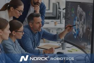 A team of Norck Robotics engineers collaborates on an advanced 3D robotic design, applying engineering expertise to optimize automation systems for performance and efficiency.