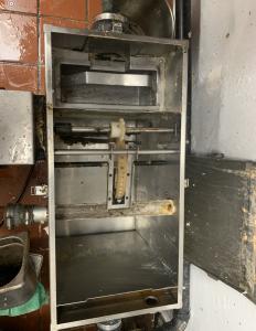 after a successful grease removal service, a clean grease trap in a restaurant of San Diego