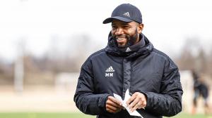 Michael Nsien coaching soccer